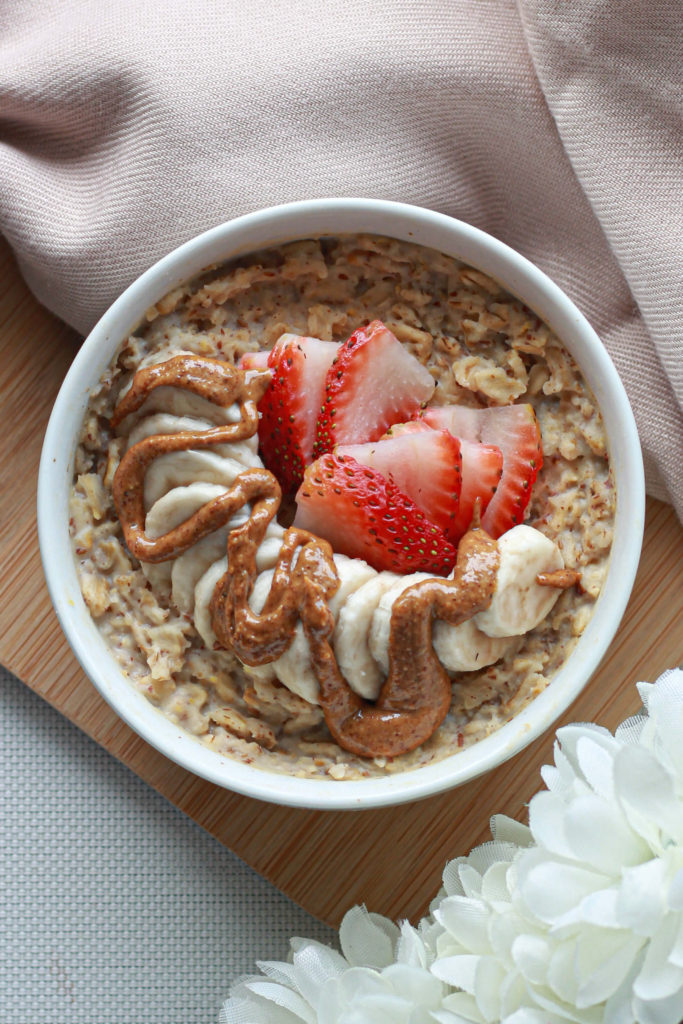 salted caramel oatmeal recipe with strawberry and banana toppings