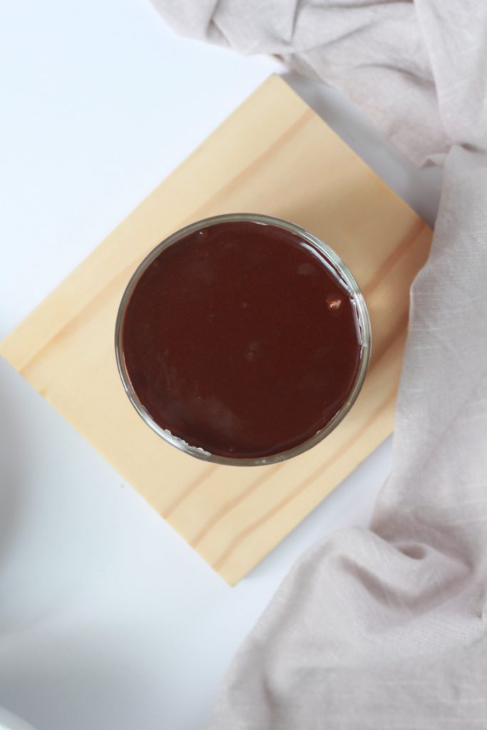showing chocolate ganache for chocolate peanut butter overnight oats