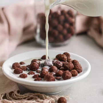 homemade nesquik cereal with a shot of milk