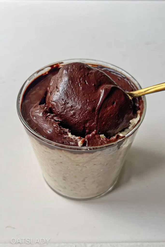 vanilla overnight oats with chocolate ganache spoonful