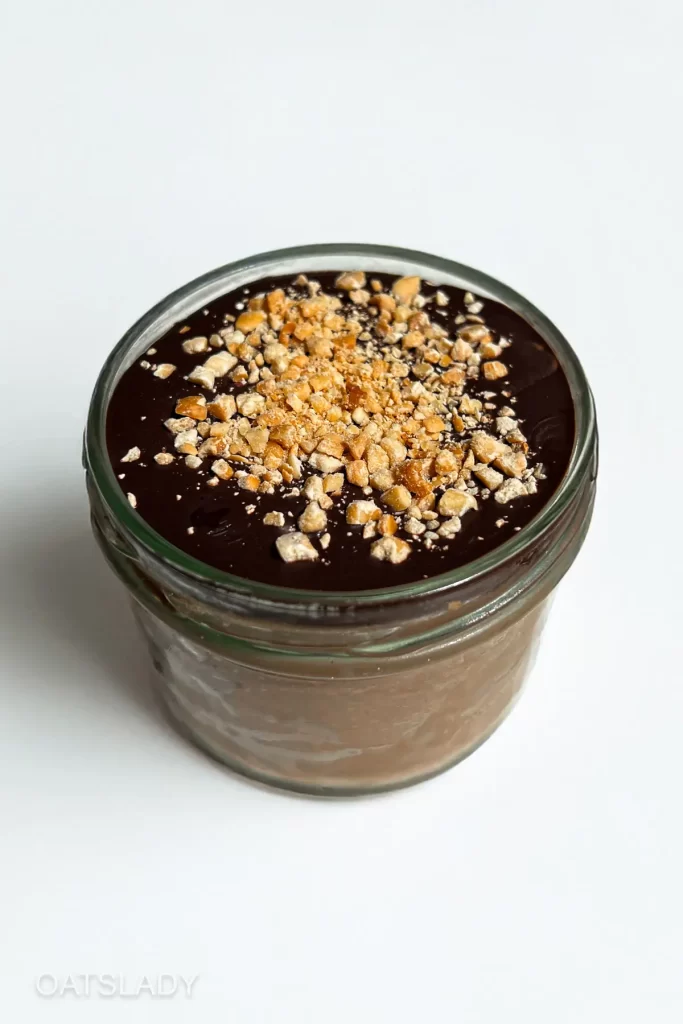 showing a peanut butter mousse topped with a hard chocolate shell